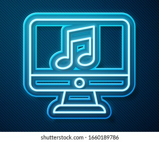 Glowing neon line Computer with music note symbol on screen icon isolated on blue background.  Vector Illustration