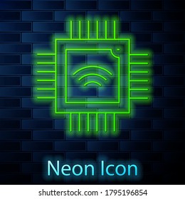 Glowing neon line Computer processor with microcircuits CPU icon isolated on brick wall background. Chip or cpu with circuit board. Micro processor. Vector