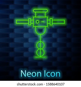 Glowing neon line Construction jackhammer icon isolated on brick wall background.  Vector Illustration