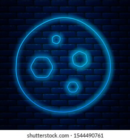 Glowing neon line Cookie or biscuit with chocolate icon isolated on brick wall background.  Vector Illustration
