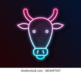 Glowing neon line Cow head icon isolated on black background.  Vector