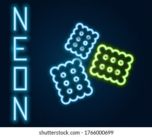 Glowing neon line Cracker biscuit icon isolated on black background. Sweet cookie. Colorful outline concept. Vector Illustration