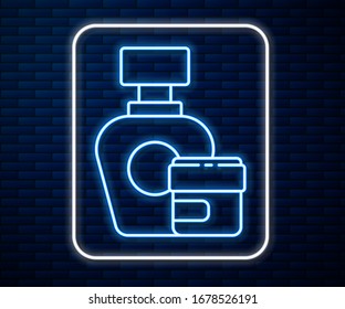Glowing neon line Cream or lotion cosmetic tube icon isolated on brick wall background. Body care products for men.  Vector Illustration