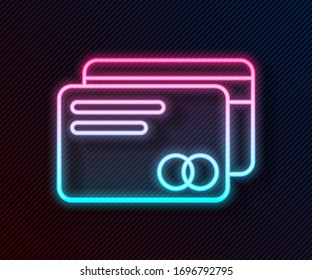 Glowing neon line Credit card icon isolated on black background. Online payment. Cash withdrawal. Financial operations. Shopping sign.  Vector Illustration