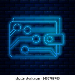 Glowing neon line Cryptocurrency wallet icon isolated on brick wall background. Wallet and bitcoin sign. Mining concept. Money, payment, cash, pay icon.  Vector Illustration