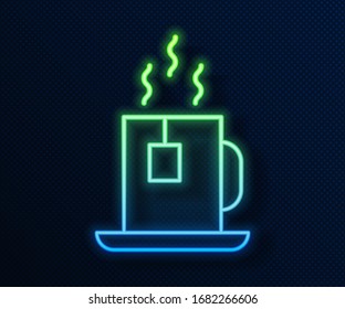 Glowing neon line Cup of tea with tea bag icon isolated on blue background.  Vector Illustration