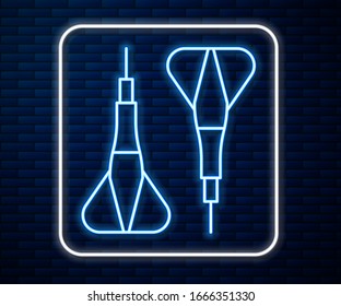 Glowing neon line Dart arrow icon isolated on brick wall background.  Vector Illustration