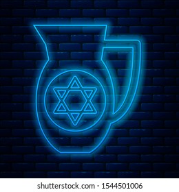 Glowing neon line Decanter with star of david icon isolated on brick wall background. Pottery jug. Organic product in carafe.  Vector Illustration