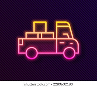Glowing neon line Delivery truck with cardboard boxes behind icon isolated on black background.  Vector