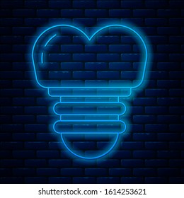 Glowing neon line Dental implant icon isolated on brick wall background.  Vector Illustration