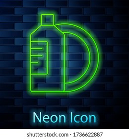 Glowing neon line Dishwashing liquid bottle and plate icon isolated on brick wall background. Liquid detergent for washing dishes. Vector Illustration