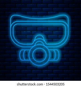 Glowing neon line Diving mask icon isolated on brick wall background. Extreme sport. Sport equipment.  Vector Illustration