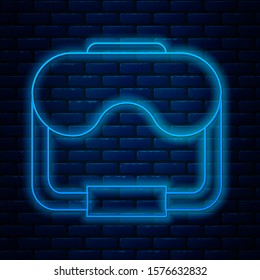 Glowing neon line Diving mask icon isolated on brick wall background. Extreme sport. Diving underwater equipment.  Vector Illustration