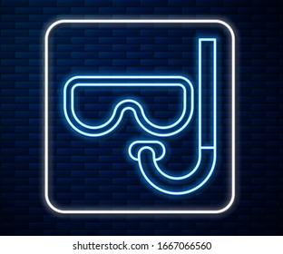 Glowing neon line Diving mask and snorkel icon isolated on brick wall background. Extreme sport. Diving underwater equipment.  Vector Illustration