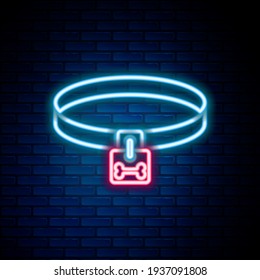 Glowing neon line Dog collar with name tag and bone plaque icon isolated on brick wall background. Supplies for domestic animal. Cat and dog care. Pet dog chains. Colorful outline concept. Vector