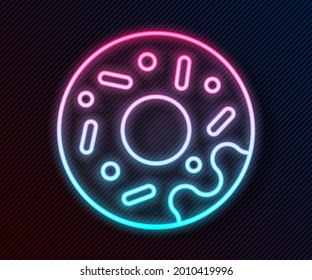 Glowing neon line Donut with sweet glaze icon isolated on black background.  Vector