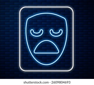 Glowing neon line Drama theatrical mask icon isolated on brick wall background.  Vector