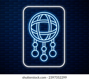 Glowing neon line Dream catcher with feathers icon isolated on brick wall background.  Vector