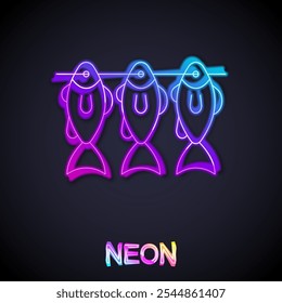 Glowing neon line Dried fish icon isolated on black background.  Vector