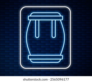 Glowing neon line Drum icon isolated on brick wall background. Music sign. Musical instrument symbol.  Vector