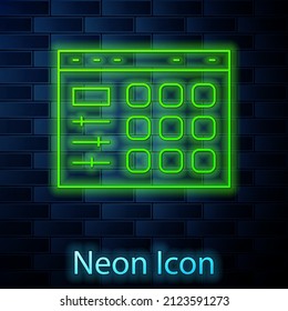 Glowing neon line Drum machine icon isolated on brick wall background. Musical equipment.  Vector