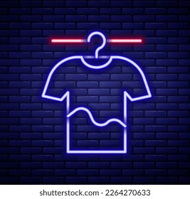 Glowing neon line Drying clothes icon isolated on brick wall background. Clean shirt. Wash clothes on a rope with clothespins. Clothing care and tidiness. Colorful outline concept. Vector