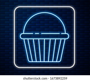 Glowing neon line Easter cake icon isolated on brick wall background. Happy Easter.  Vector Illustration