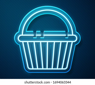 Glowing neon line Easter cake icon isolated on blue background. Happy Easter.  Vector Illustration