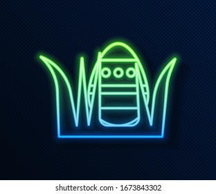 Glowing neon line Easter egg icon isolated on blue background. Happy Easter.  Vector Illustration