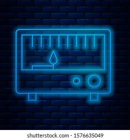 Glowing neon line Electrical measuring instruments icon isolated on brick wall background. Analog devices. Electrical appliances.  Vector Illustration