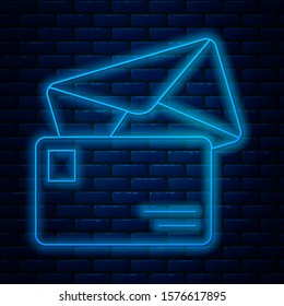 Glowing neon line Envelope icon isolated on brick wall background. Email message letter symbol.  Vector Illustration