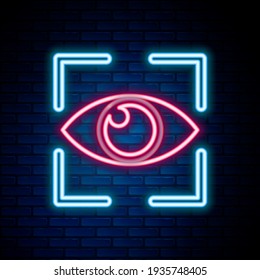 Glowing neon line Eye scan icon isolated on brick wall background. Scanning eye. Security check symbol. Cyber eye sign. Colorful outline concept. Vector