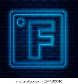 Glowing neon line Fahrenheit icon isolated on brick wall background.  Vector Illustration