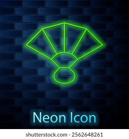 Glowing neon line Fan flamenco accessory icon isolated on brick wall background.  Vector