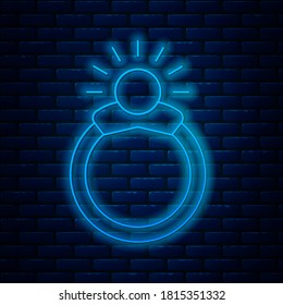 Glowing neon line Fantasy magic stone ring with gem icon isolated on brick wall background.  Vector Illustration
