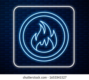 Glowing neon line Fire flame icon isolated on brick wall background.  Vector Illustration