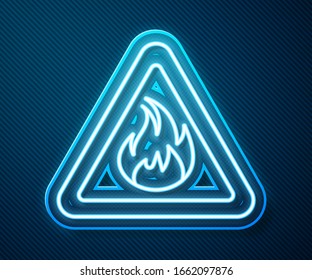 Glowing neon line Fire flame in triangle icon isolated on blue background. Warning sign of flammable product.  Vector Illustration