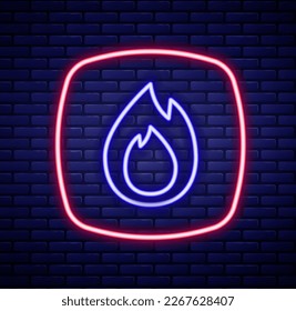 Glowing neon line Fire flame icon isolated on brick wall background. Colorful outline concept. Vector