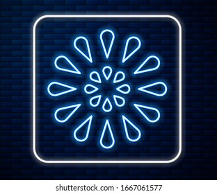 Glowing neon line Firework icon isolated on brick wall background. Concept of fun party. Explosive pyrotechnic symbol.  Vector Illustration