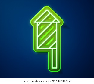 Glowing neon line Firework rocket icon isolated on blue background. Concept of fun party. Explosive pyrotechnic symbol.  Vector