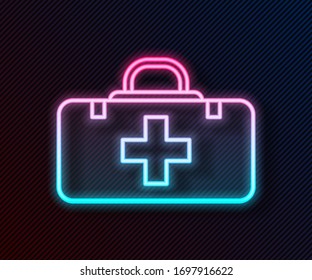 Glowing neon line First aid kit icon isolated on black background. Medical box with cross. Medical equipment for emergency. Healthcare concept.  Vector Illustration