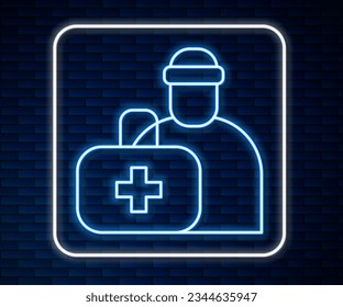 Glowing neon line First aid kit icon isolated on brick wall background. Medical box with cross. Medical equipment for emergency. Healthcare concept.  Vector