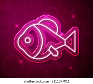 Glowing neon line Fish icon isolated on red background.  Vector