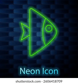 Glowing neon line Fish icon isolated on brick wall background.  Vector