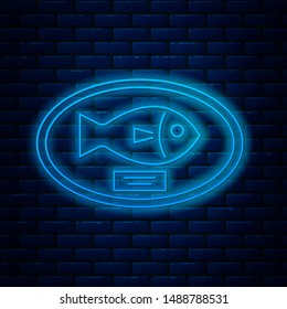 Glowing neon line Fish trophy hanging on the board icon isolated on brick wall background. Fishing trophy on wall.  Vector Illustration