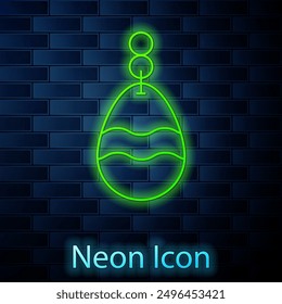 Glowing neon line Fishing spoon icon isolated on brick wall background. Fishing baits in shape of fish. Fishing tackle.  Vector