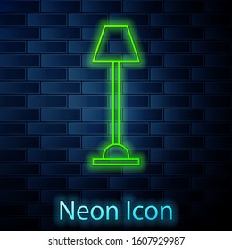 Glowing neon line Floor lamp icon isolated on brick wall background.  Vector Illustration