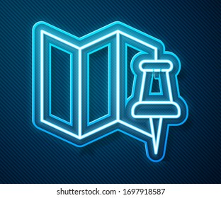 Glowing neon line Folded map with push pin icon isolated on blue background.  Vector Illustration