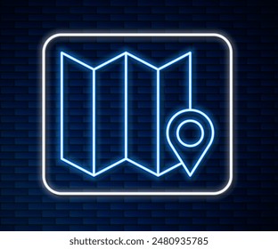 Glowing neon line Folded map with location marker icon isolated on brick wall background.  Vector