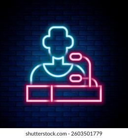 Glowing neon line Football player press conference icon isolated on brick wall background. Colorful outline concept. Vector